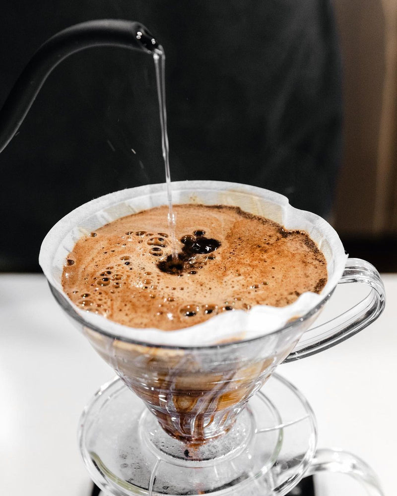 Single origin coffee - pouring organic coffee
