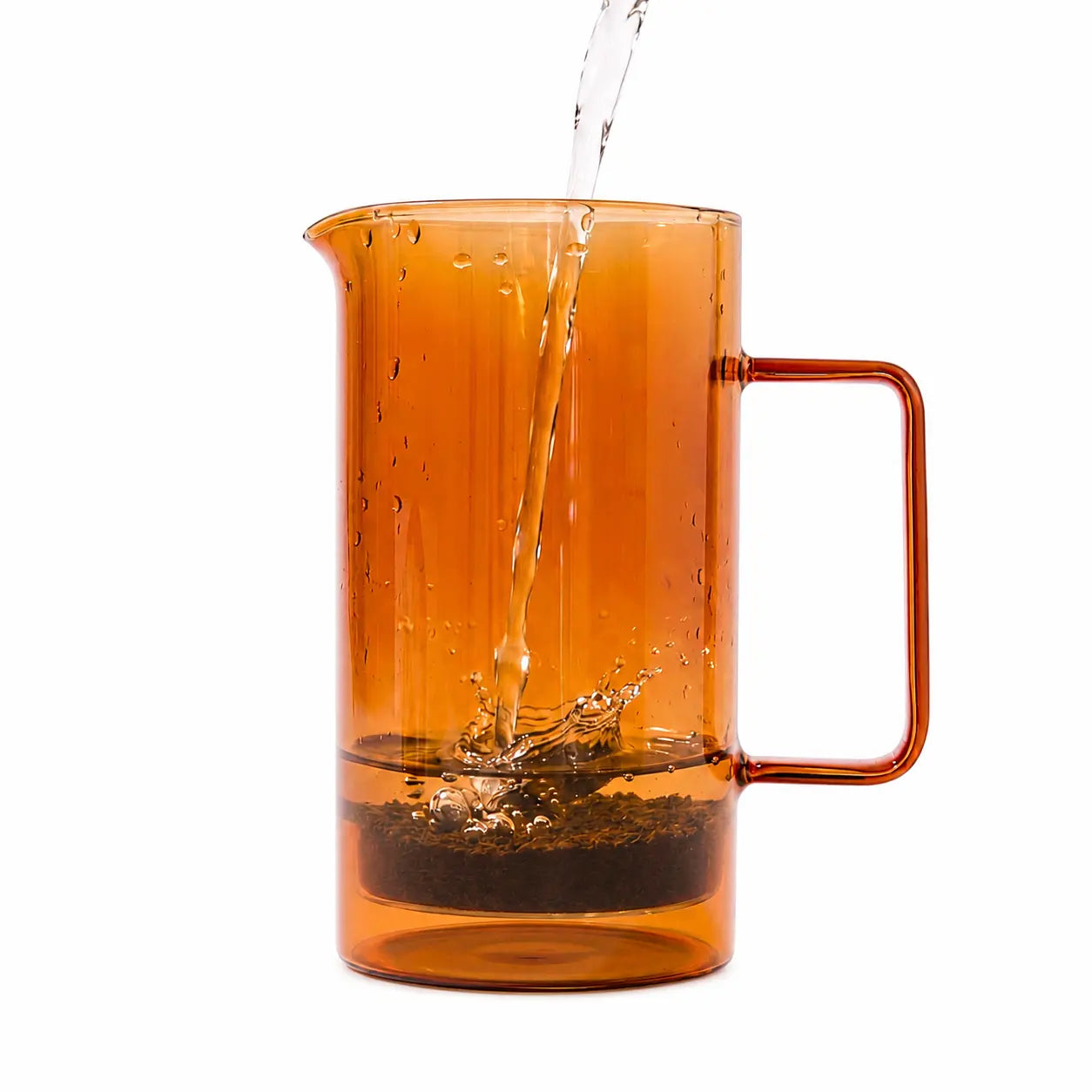 Glass French press coffee maker shown from the front angle