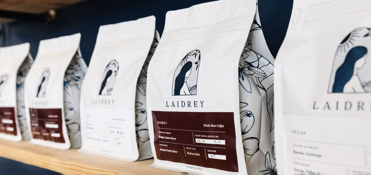 Laidrey Coffe Bags Lined on a Shelf at Laidrey Cafe in Los Angeles