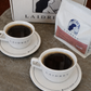 Laidrey Honduras dark roast coffee with two white ceramic cup and saucer sets for Mother’s Day gift